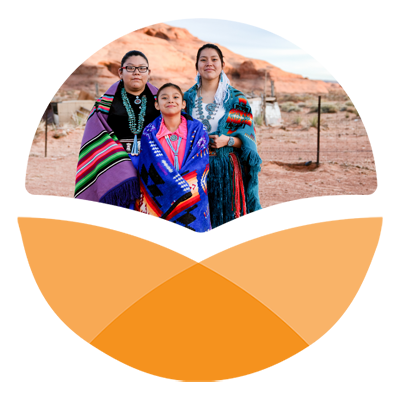 Orange stylized circle with photo in top portion of Native American children