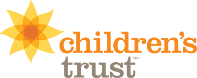 Childrens Trust Massachusetts Logo - Orange and tan serif type with orange and yellow flower icon to left