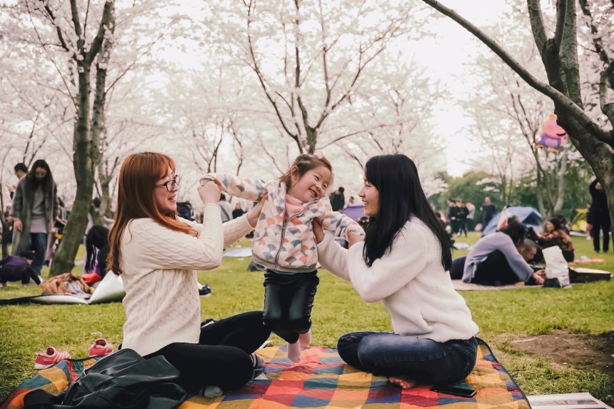 Parents and child at picnic