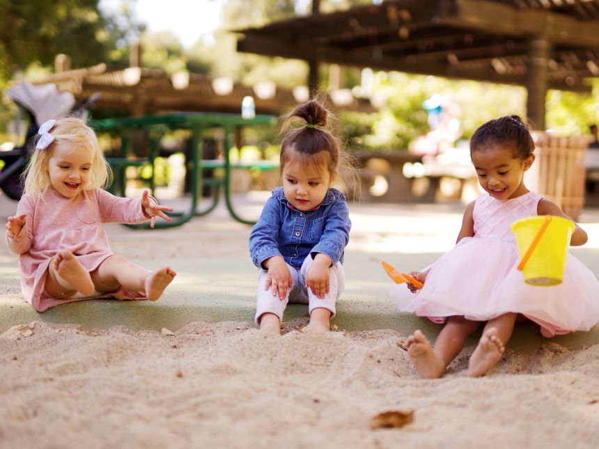 Children playing in the sand.