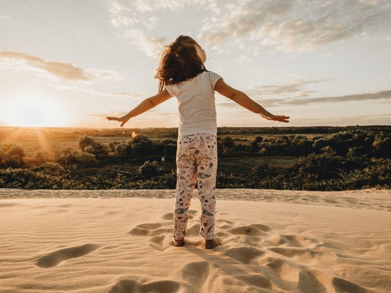 Young girl in sand