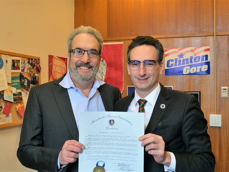 Dr. Sege and a member of Massachusetts legislature are holding the declaration of the Week of HOPE.