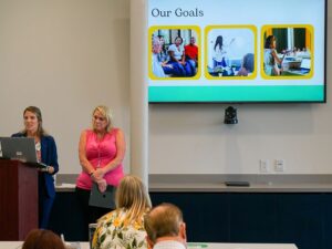 Presenters talking to attendees of the Tennessee HOPE convening.